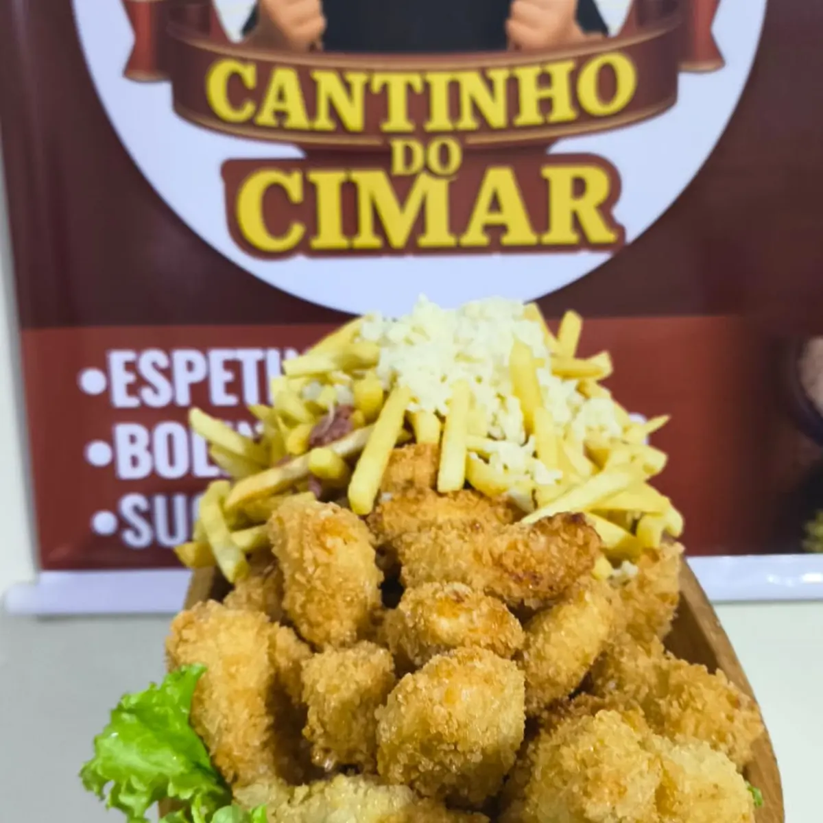 Porção empanada da casa